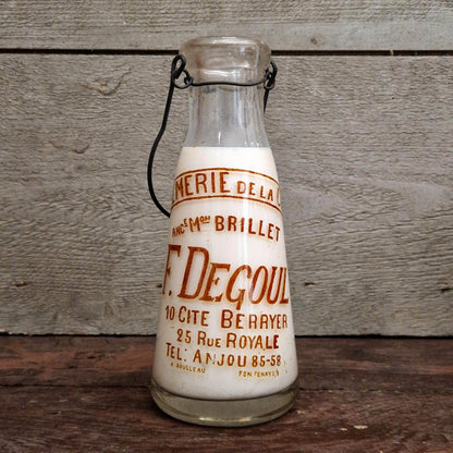 Bouteille de lait « F. Degoul, Crèmerie de la Cité » Paris