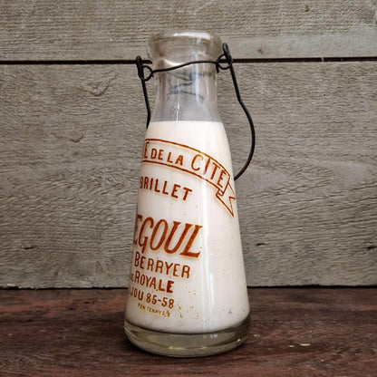 Bouteille de lait « F. Degoul, Crèmerie de la Cité » Paris