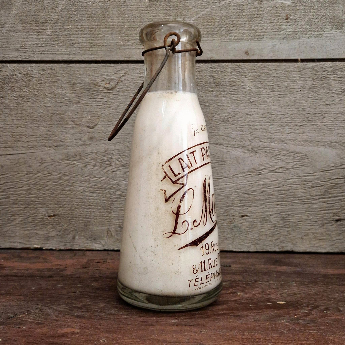 Bouteille de lait « L. Maillet, Partis » - Début XXe