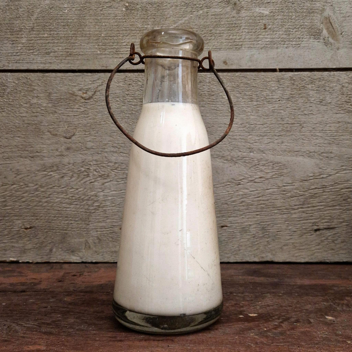 Bouteille de lait « L. Maillet, Partis » - Début XXe
