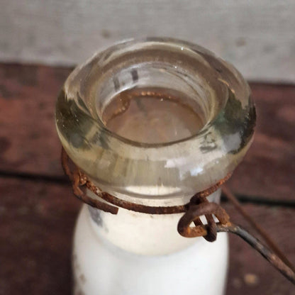Bouteille de lait « L. Maillet, Partis » - Début XXe