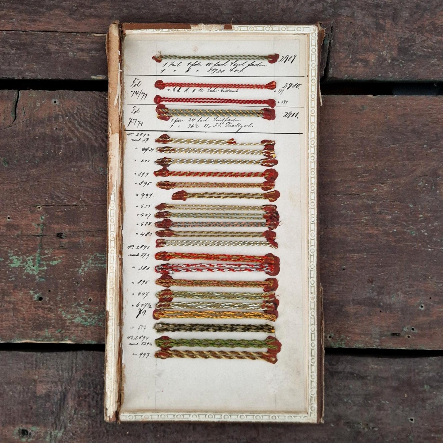 Sample board - Polychrome cords and metallic threads
