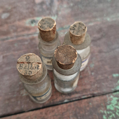 Set of 4 antique homeopathic vials (l17)