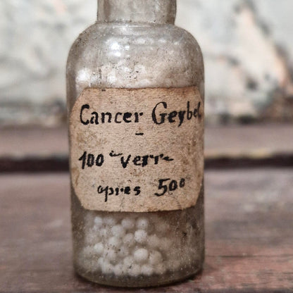 Old pharmaceutical bottle "Cancer" (f51)