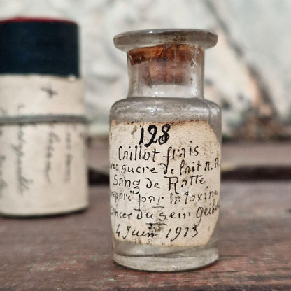 "Fresh Clot - Breast Cancer" bottle with case - 1913 (f29)