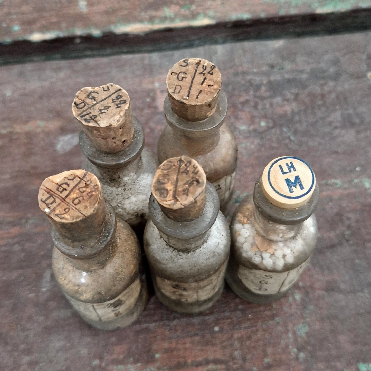 Antique bottles "S.G.D. numbered series" (l27)