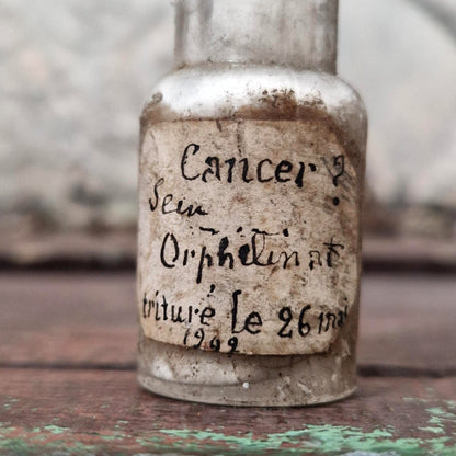 Medical curiosity: Vial "Cancer? Orphanage breast" (f27)