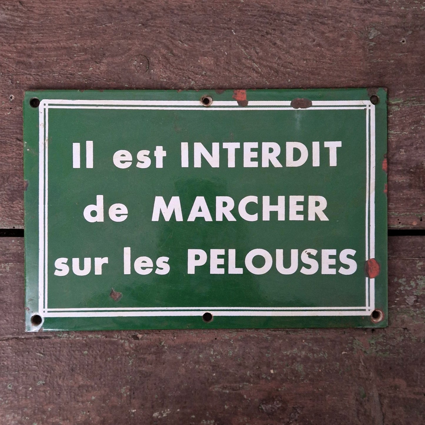 Plaque émaillée « Interdit de marcher sur la pelouse »