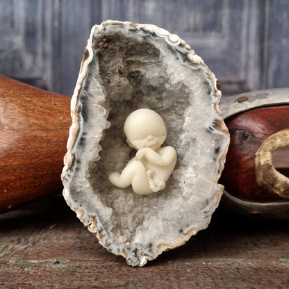 Ancient geode with wax fetus - Circa 1950