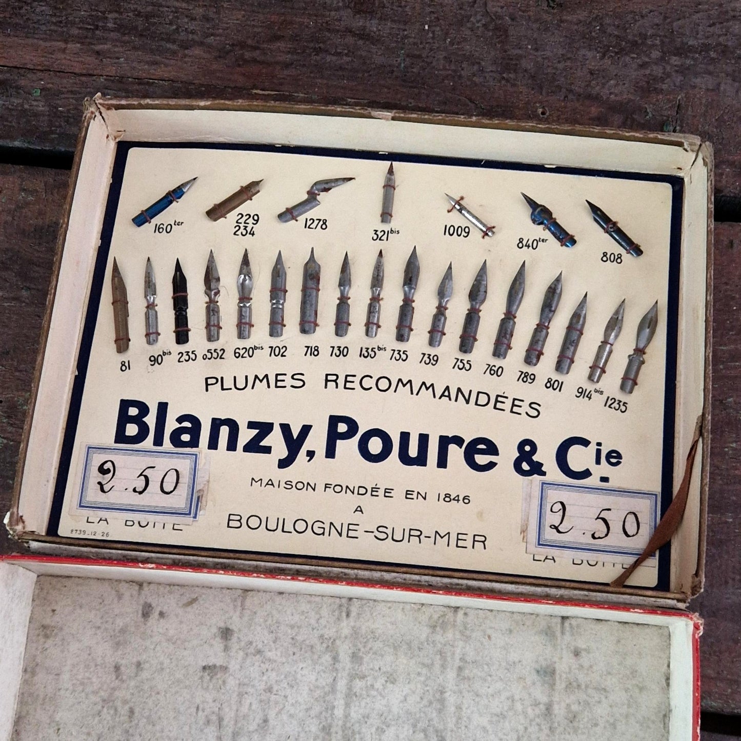 Ancien présentoir de plumes Blanzy, Poure & Cie