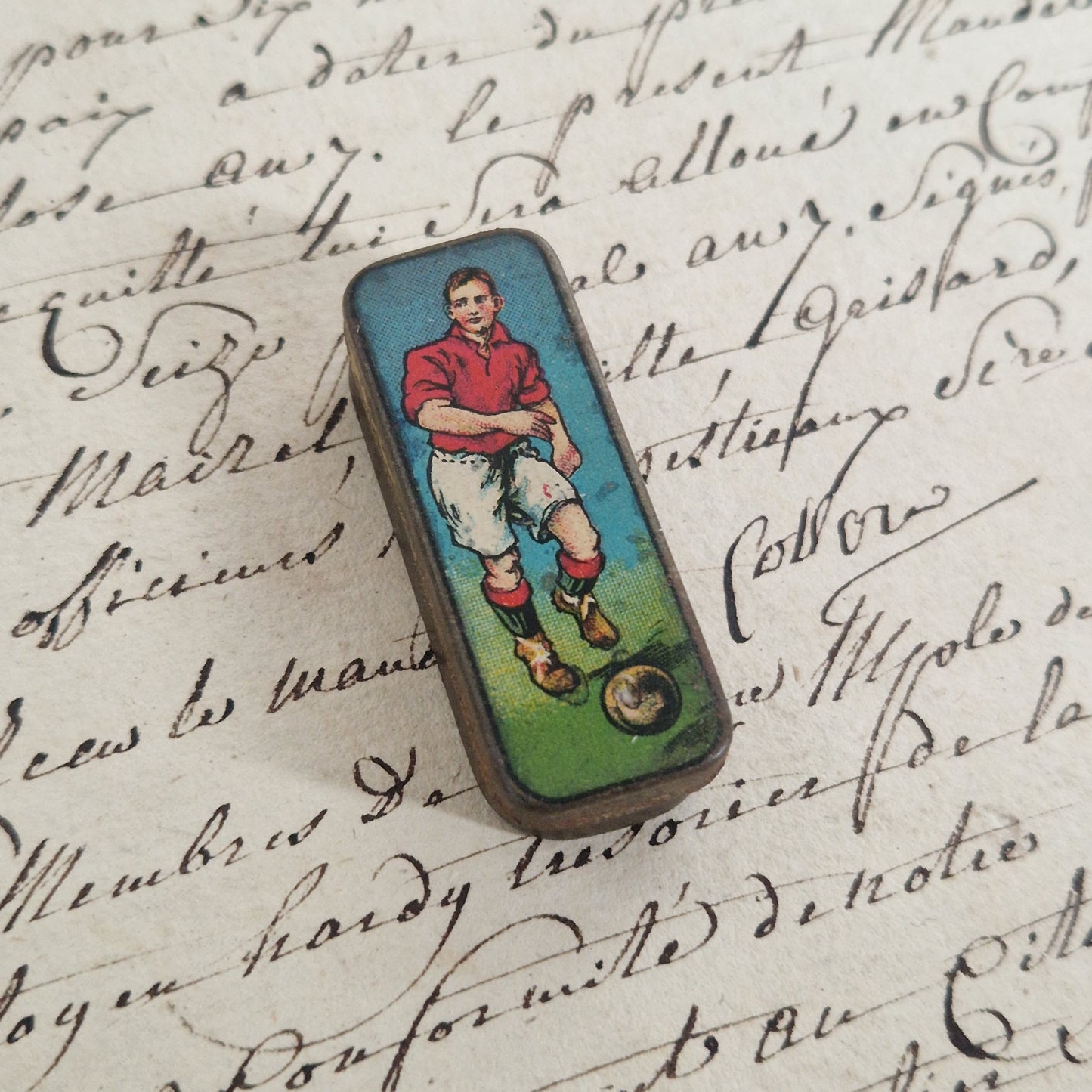 Boîte illustrée « Joueur de football » pour plumes