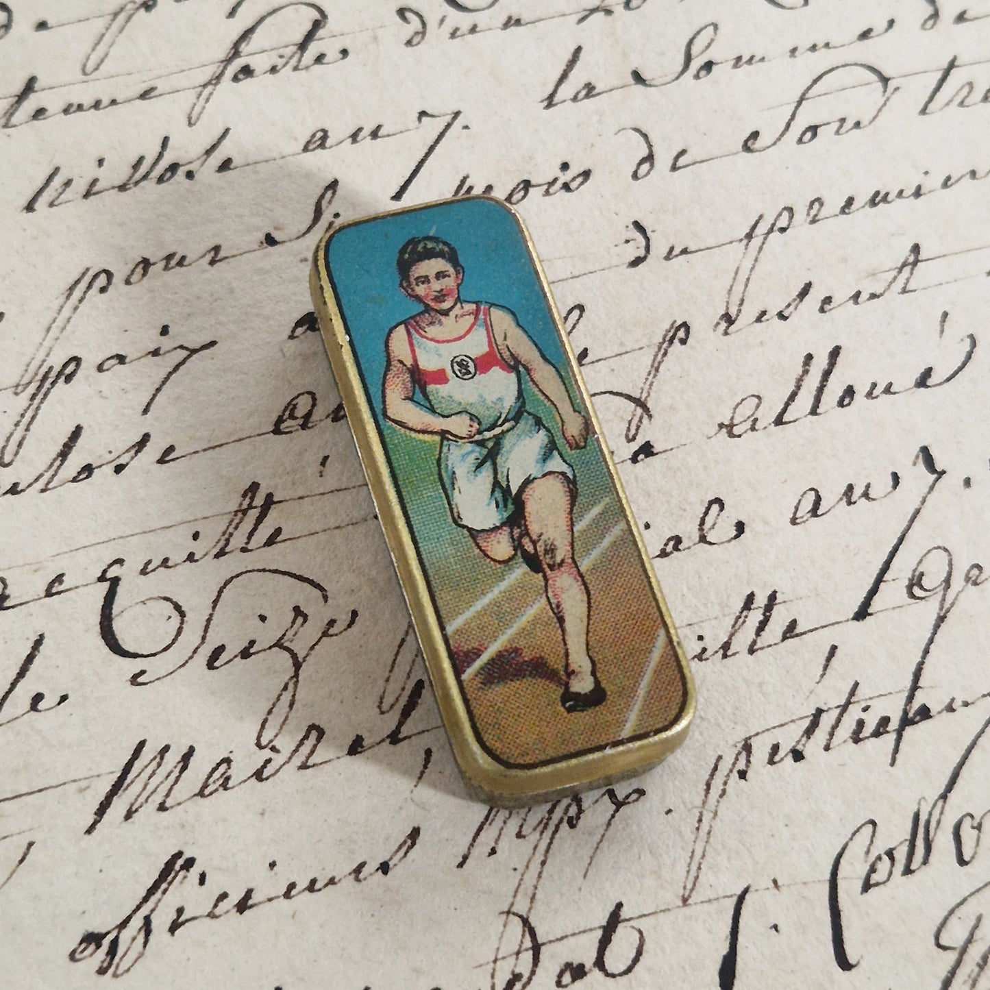 Boîte illustrée « Coureur » pour plumes