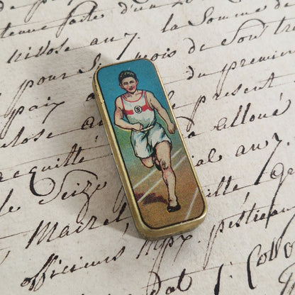 Boîte illustrée « Coureur » pour plumes
