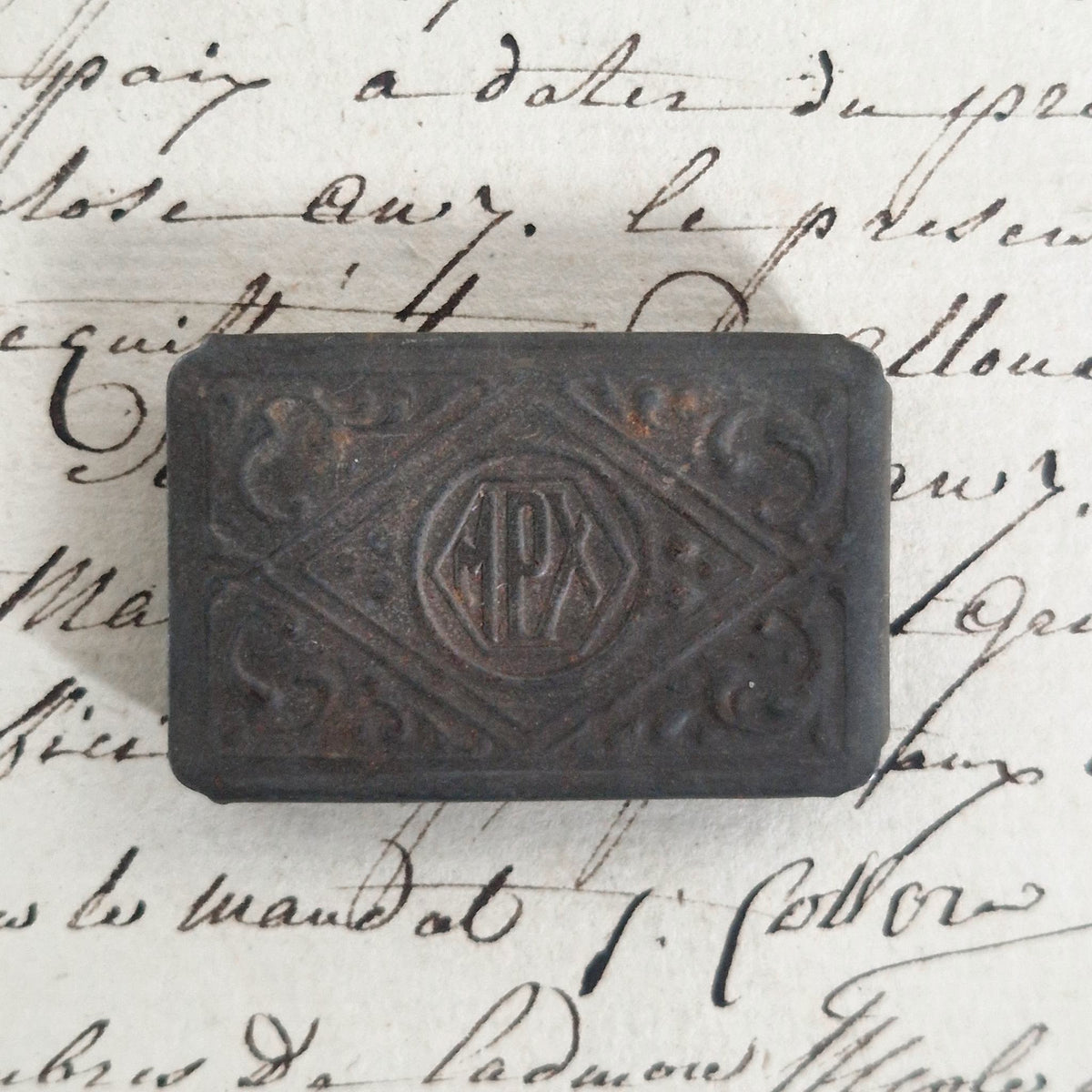 Old embossed metal pen box - "MPX"