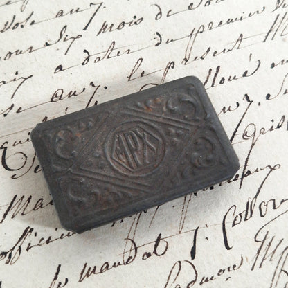 Old embossed metal pen box - "MPX"