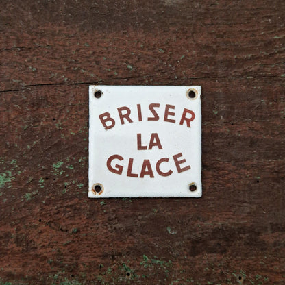 Ancienne plaque émaillée « Briser la glace »