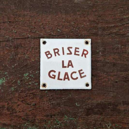 Ancienne plaque émaillée « Briser la glace »
