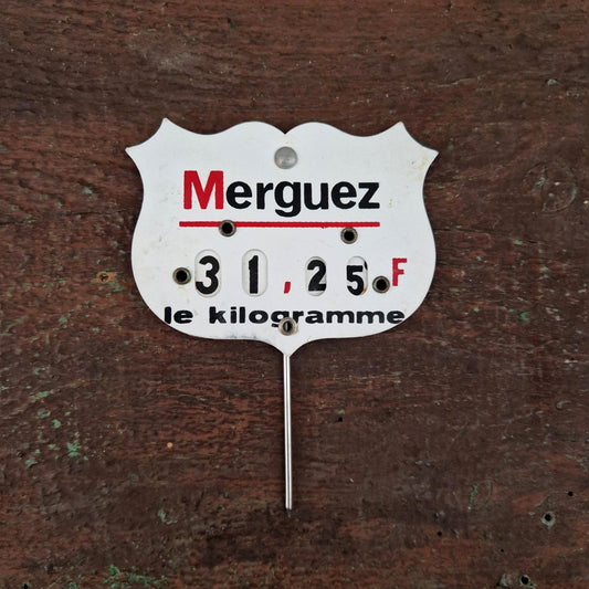 Étiquette de prix ancienne « Merguez » à roulettes