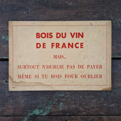 Pancarte « Bois du vin... mais n'oublie pas de payer »