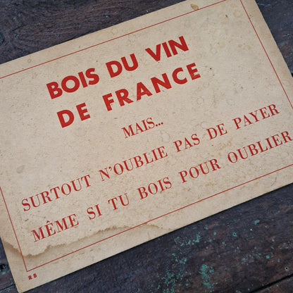 Pancarte « Bois du vin... mais n'oublie pas de payer »