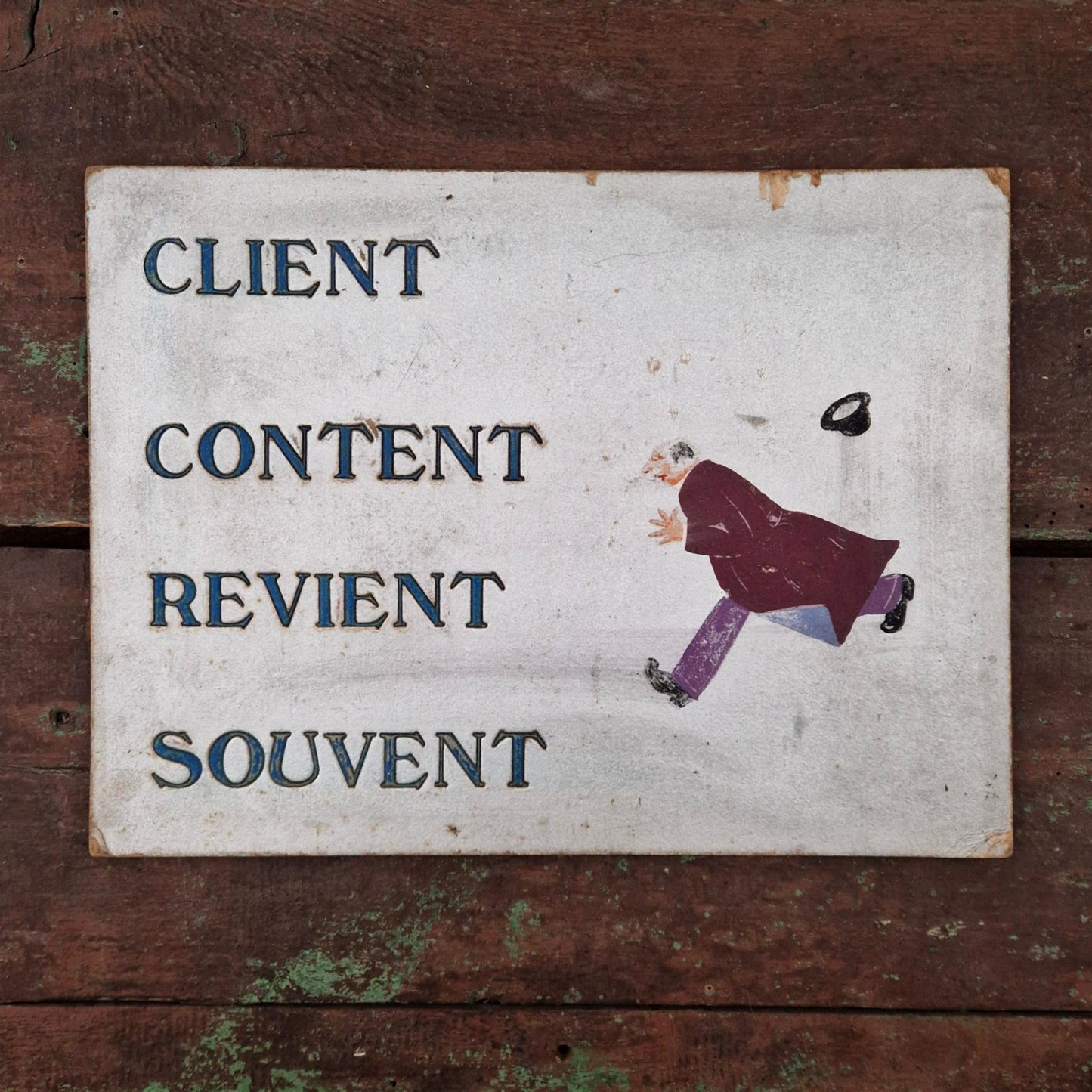 Old sign: "A satisfied customer often returns"