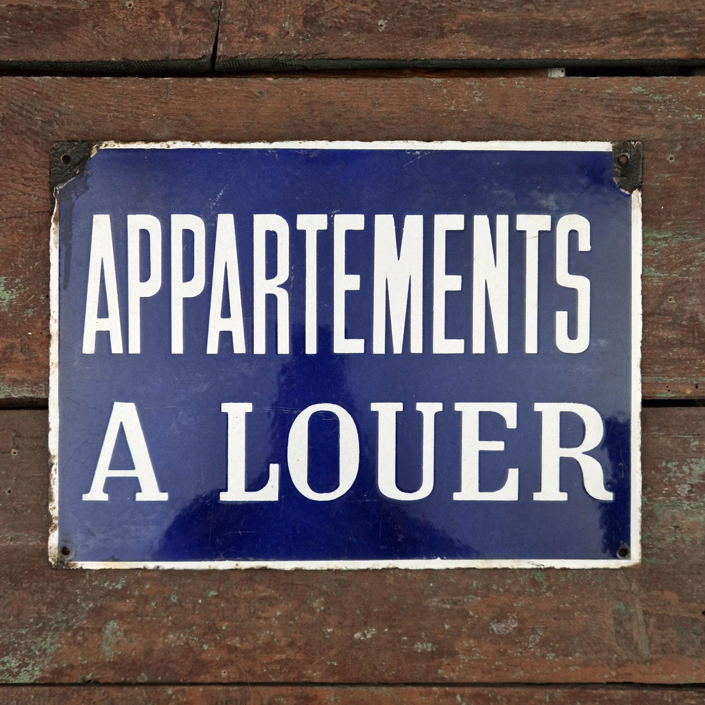 Vintage enamelled sign "Apartments for Rent"