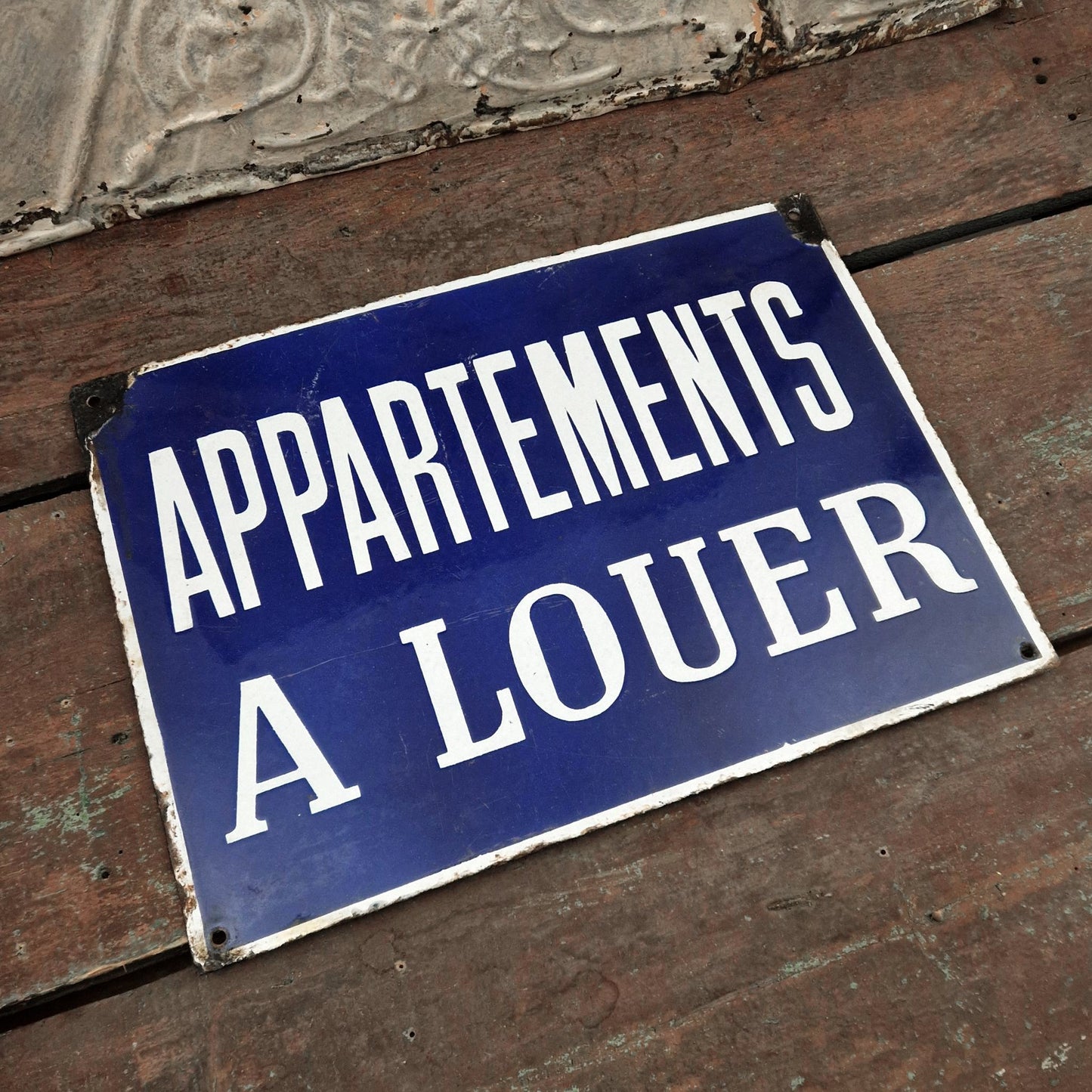Vintage enamelled sign "Apartments for Rent"