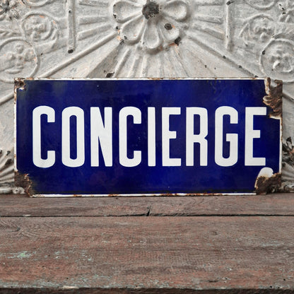 Plaque émaillée bleue « Concierge »