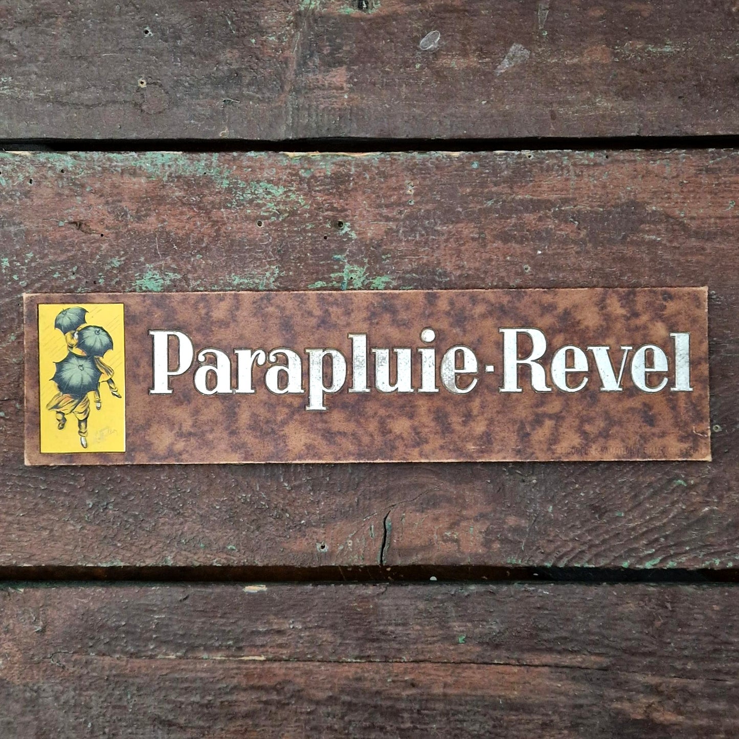 Carton publicitaire de comptoir « Parapluie-Revel »