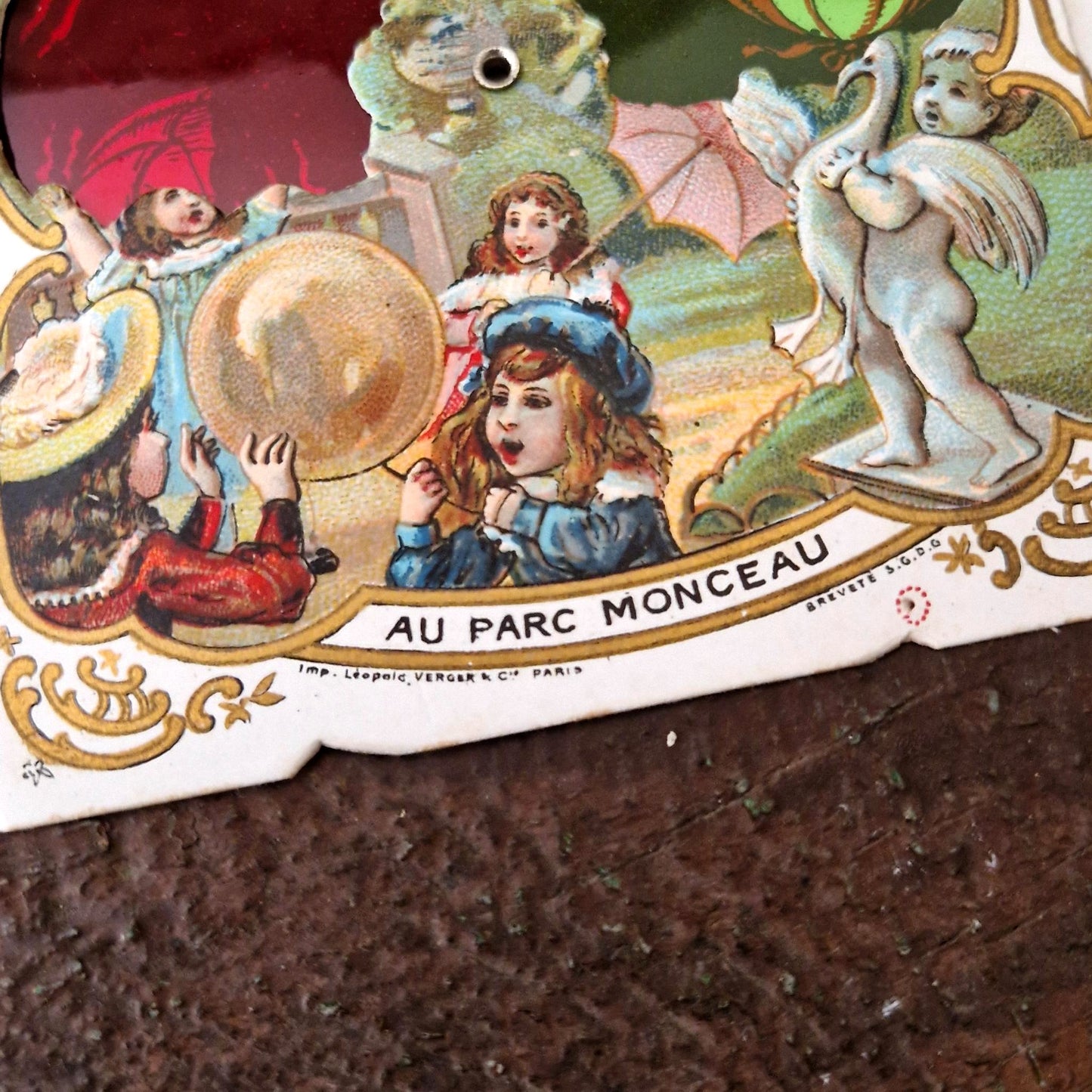 Ancienne publicité à système « Au Bon Marché - Parc Monceau »