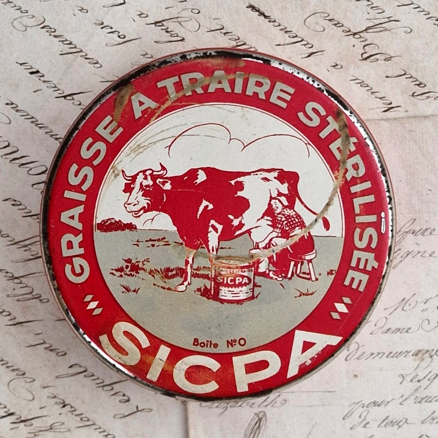 Boîte publicitaire  « Graisse à traire stérilisée SICPA »