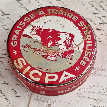 Boîte publicitaire  « Graisse à traire stérilisée SICPA »