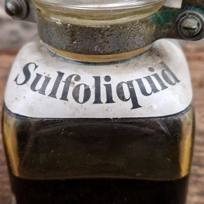 Rare flacon d’apothicaire « Sulfoliquid » avec fermoir
