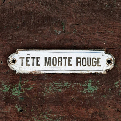 « Tête Morte Rouge » - Plaque émaillée ancienne vers 1900