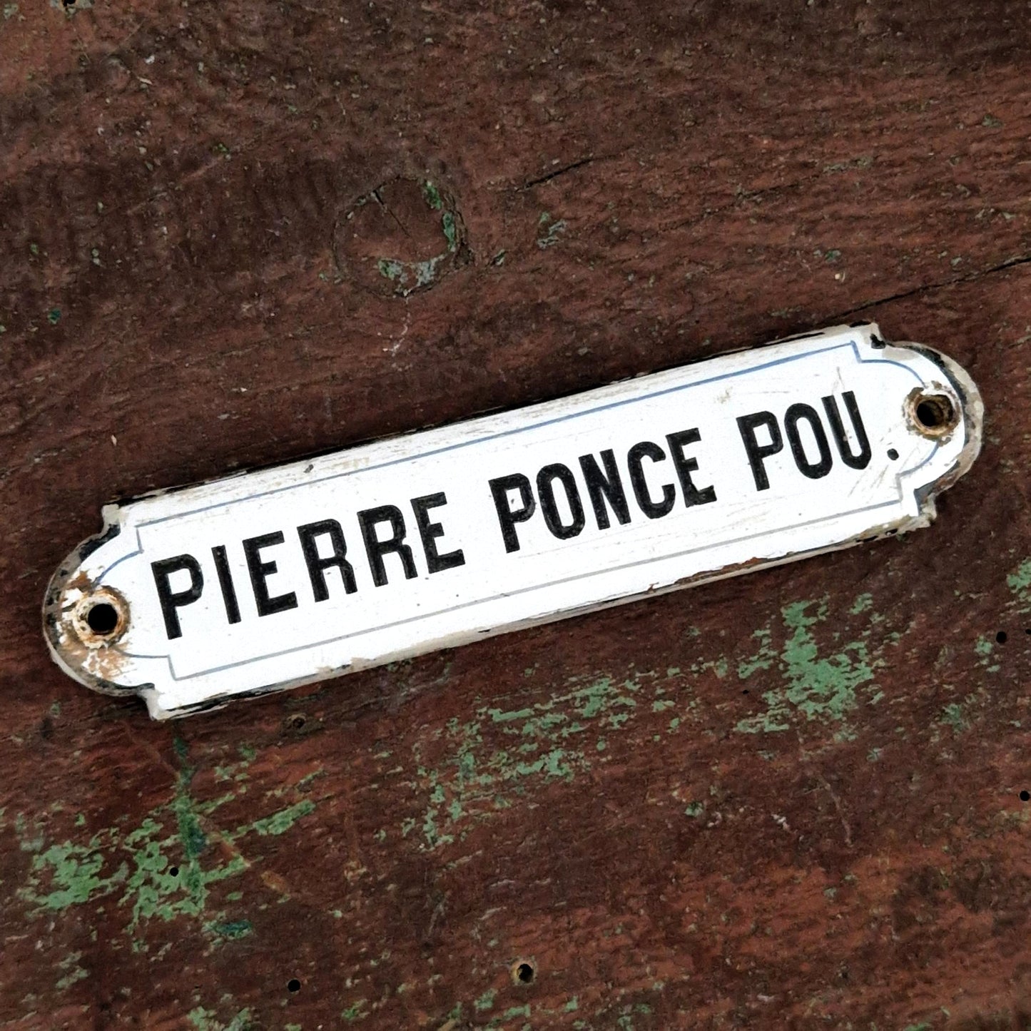 Ancienne plaque émaillée « Pierre Ponce Pou. », vers 1900