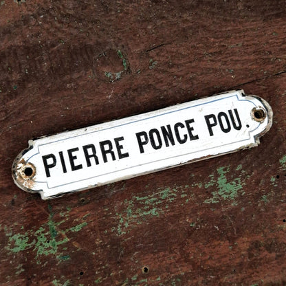 Ancienne plaque émaillée « Pierre Ponce Pou. », vers 1900