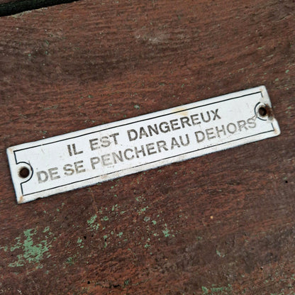 Plaque émaillée « Il est dangereux de se pencher... »