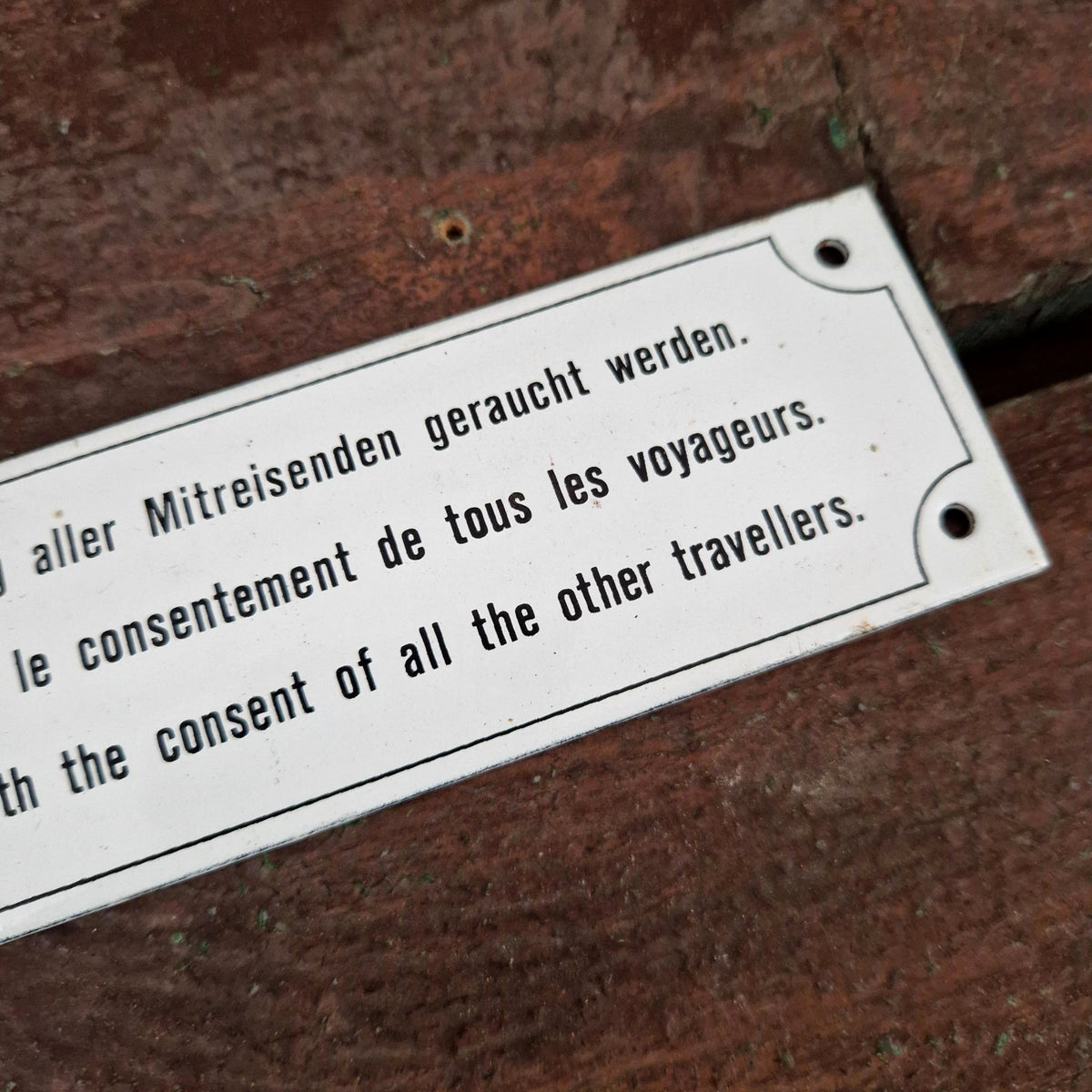 Plaque émaillée originale « Consentement des voyageurs »
