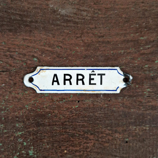 Old enameled sign "STOP"
