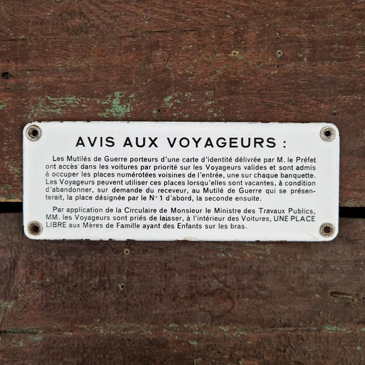 Enameled sign "Notice to Travelers / War-disabled"
