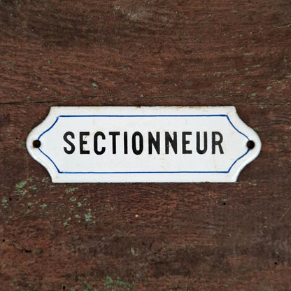 Ancienne plaque émaillée « Sectionneur »