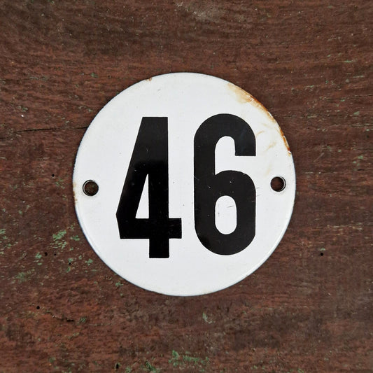 Old round enamelled sign "46"