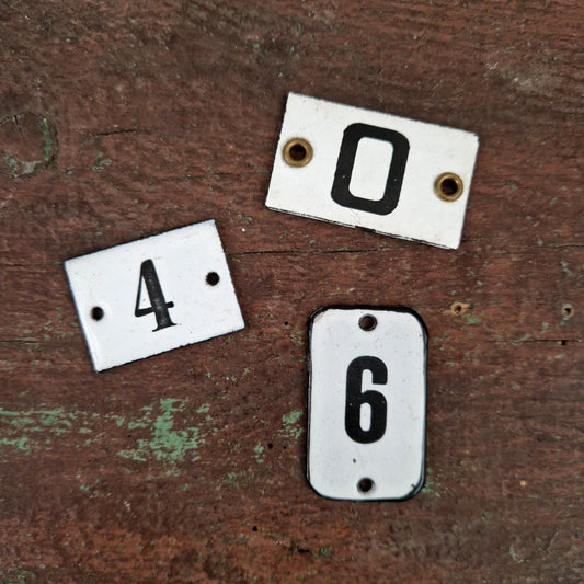 Old numbered enamel plate