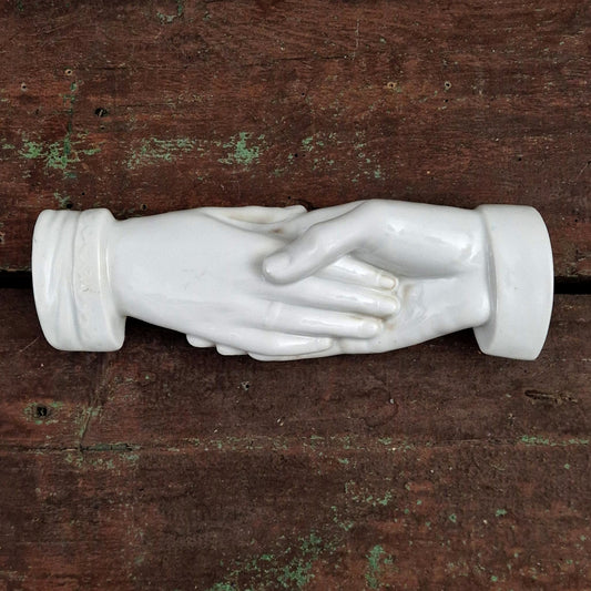 "Handshake" ornament in porcelain