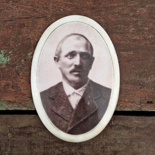 Antique porcelain medallion "Portrait with a Moustache"