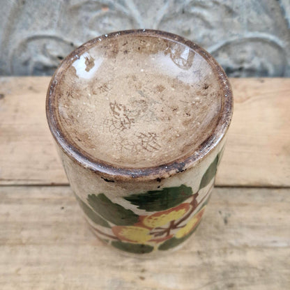Old jam jar with apple or peach decoration