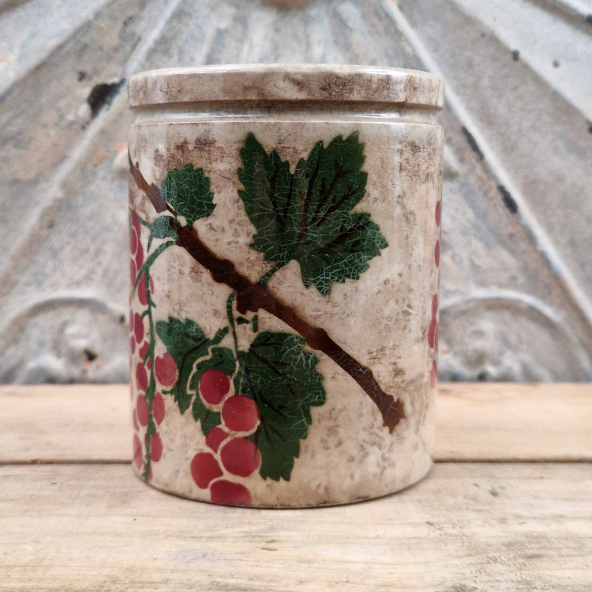 Old jam pot with gooseberry decoration