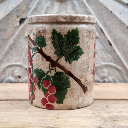 Old jam pot with gooseberry decoration