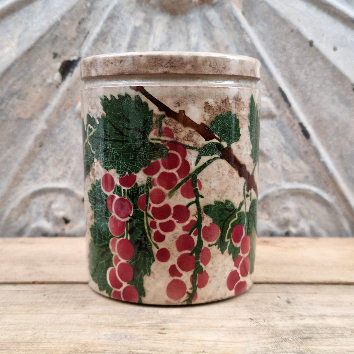Old jam pot with gooseberry decoration