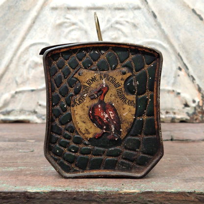 Ancienne boîte / valise croco à « Café Le pélican rouge »